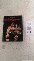Front cover of sealed Bloodsport DVD