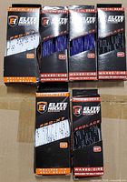 Front view showing five of the six boxed Elite Hockey Pro-X7 skate laces in white, black and purple colours