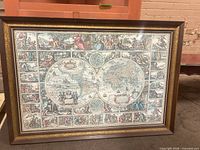 Full view of framed double hemisphere world map print