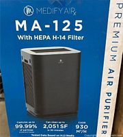 Retail box front showing Medify MA-125 air purifier image and specifications