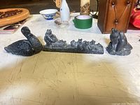 All three pewter animal figurines grouped