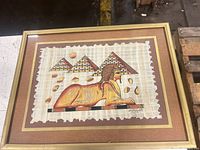 Front view of framed Egyptian papyrus art