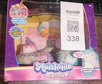 Front of sealed Winston's Bakery playset box showing contents