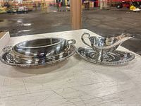 Covered serving platter and gravy boat with underplate shown together