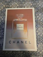 Front view showing Chanel No. 5 bottle artwork and branding