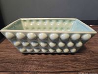 Side view showing bubble texture and overall color