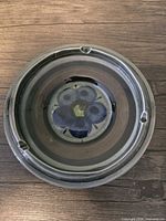 Top view showing blue floral design and four rests