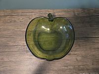 Top view of green apple-shaped glass bowl showing overall shape and interior