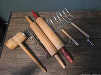 All seven kitchen tools laid out on tabletop