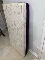 Mattress front patterned side standing upright