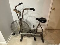 Full side view of Schwinn Airdyne bike showing frame, fan wheel, handlebars, seat, pedals