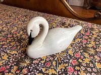 Left side view of painted wooden duck