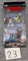 Front view of sealed blister pack showing all four figures