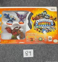 Front of boxed Skylanders Giants starter pack showing figures and branding