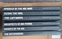 Spine view of six Epic of Flight volumes