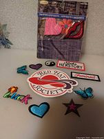 Group shot showing all patches and sealed applique pack