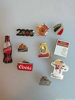 All ten enamel lapel pins grouped