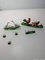 All six figurine pieces laid out