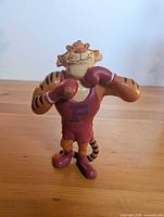 Front view of tiger boxer PVC figure showing pose, attire, and overall paint
