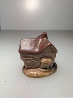 Front view of Wade miniature cottage with visible "Jack Knock" text on side