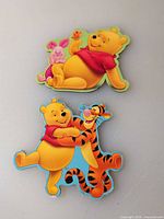 Front view showing both printed character magnets