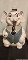 Full view of elephant cookie jar with lid on