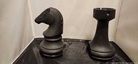 Knight and rook chess piece bookends, full view