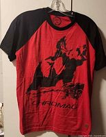 Full view of front of T-shirt showing color, graphic and condition