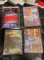 Front view of four DVD cases: Horror 3-disc set, The Blob, Teenage Zombies, Horror Express