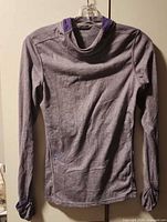 Front view of lavender Nike Dri-Fit hoodie