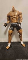 Full body view of headless Rashad Evans action figure