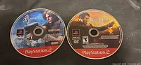 Resident Evil 4 and Rise of Honor PS2 discs front view