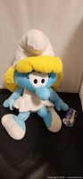 Front view of Smurfette plush showing overall appearance