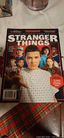 Front cover with Stranger Things cast