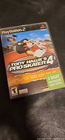 Front cover of Tony Hawk's Pro Skater 4 PS2 game case