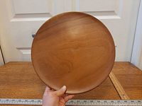 Top view showing teak grain and 12 in diameter