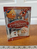 Front view of sealed DVD box set showing title and main characters