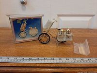 Full set with box, holder, shakers, toothpicks, ruler for scale