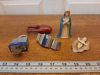 All five items with ruler for scale