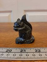 Front left view showing overall form and ruler for scale