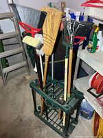 Full view of green resin caddy holding assorted tools