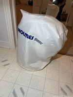 Fan inside white Holmes cover