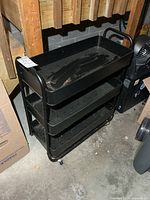 Full view of black 3-tier metal cart