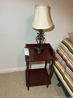 Nightstand with lamp front view