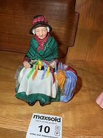 Front view of Royal Doulton Silks and Ribbons figurine showing overall appearance and colors