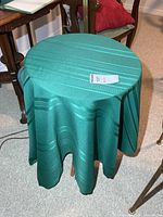 Table with green cover in place