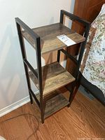 Front view of three-tier stand