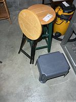 Wood bar stool, folding metal stool, plastic step stool grouped