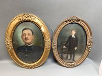 Both framed portraits side by side showing subjects and frame colors