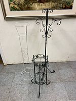 All three metal stands grouped together